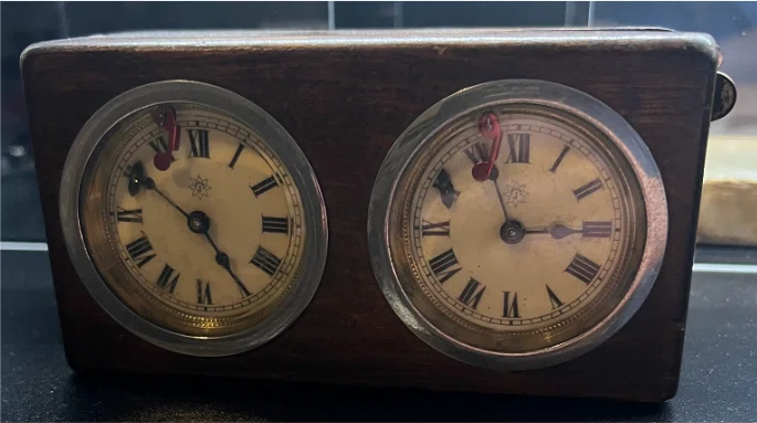 Junghans wooden chess clock, front view.