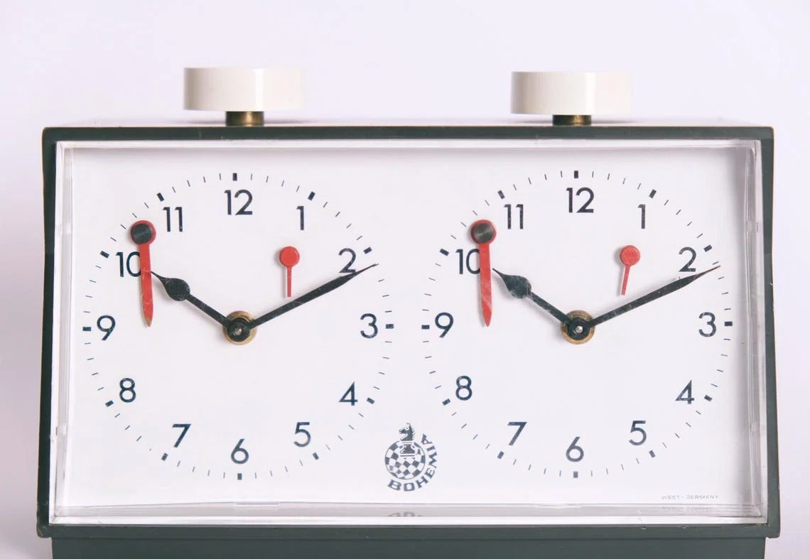 Bohemia chess clock with a single rectangular dial panel.