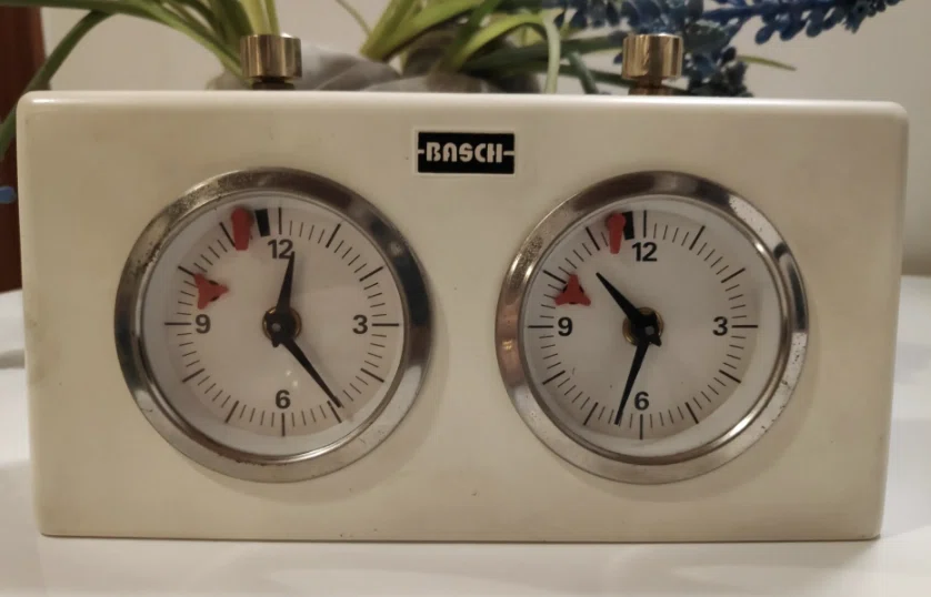 Basch-branded clock; the complete-clock attribution is disputed.