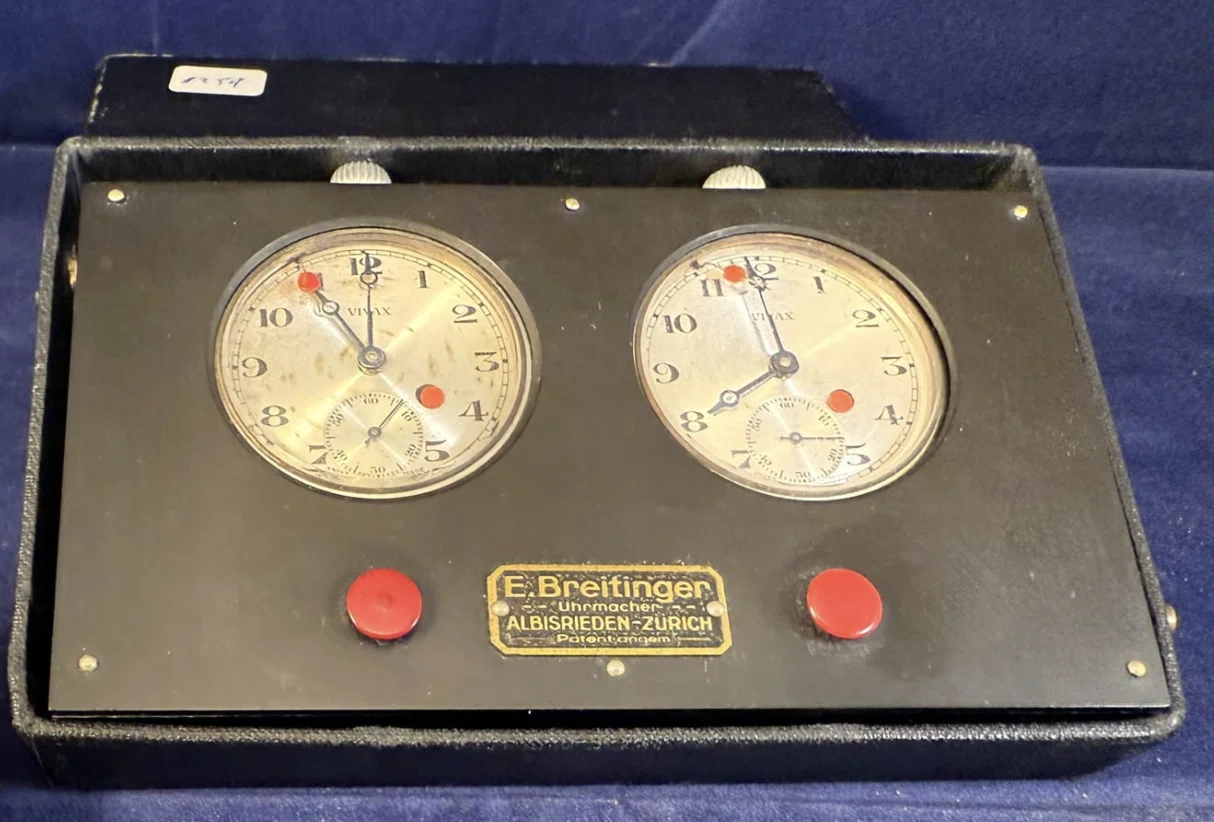 E. Breitinger clock with red front controls.