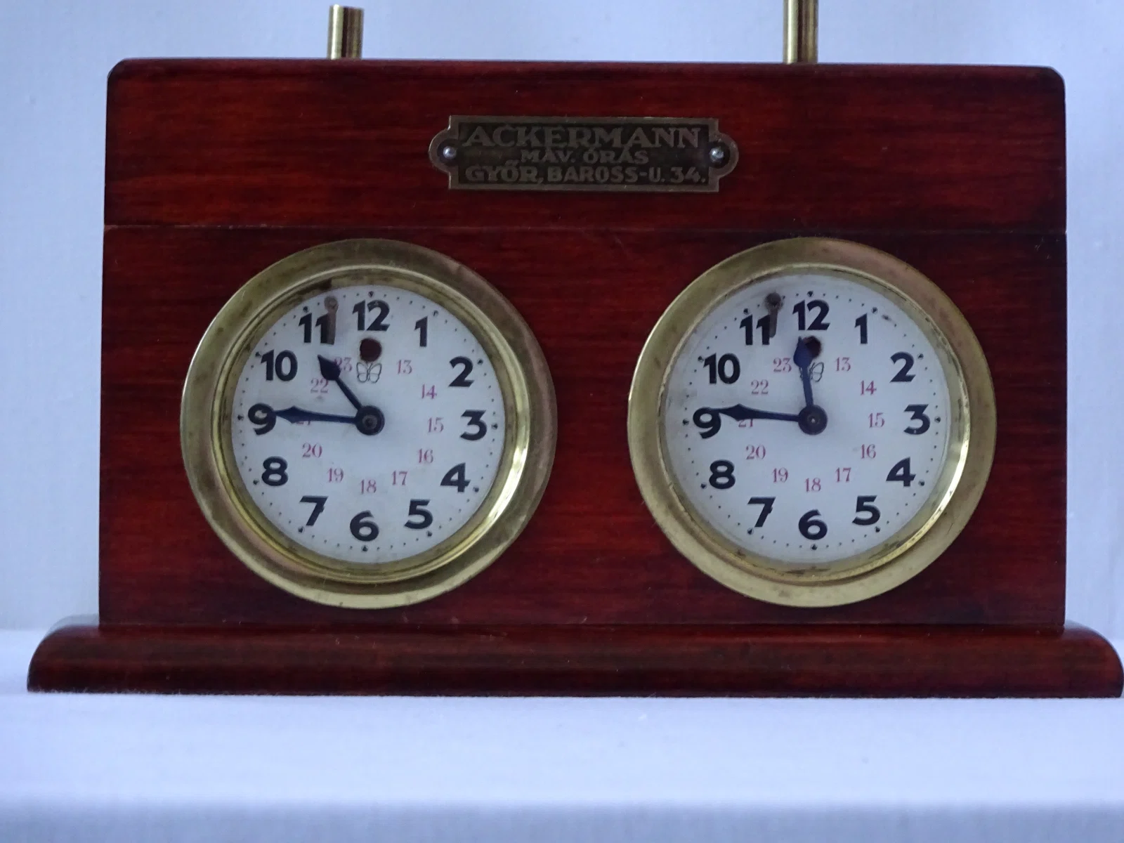 Ackermann István clock with a maker’s plate above the dials.