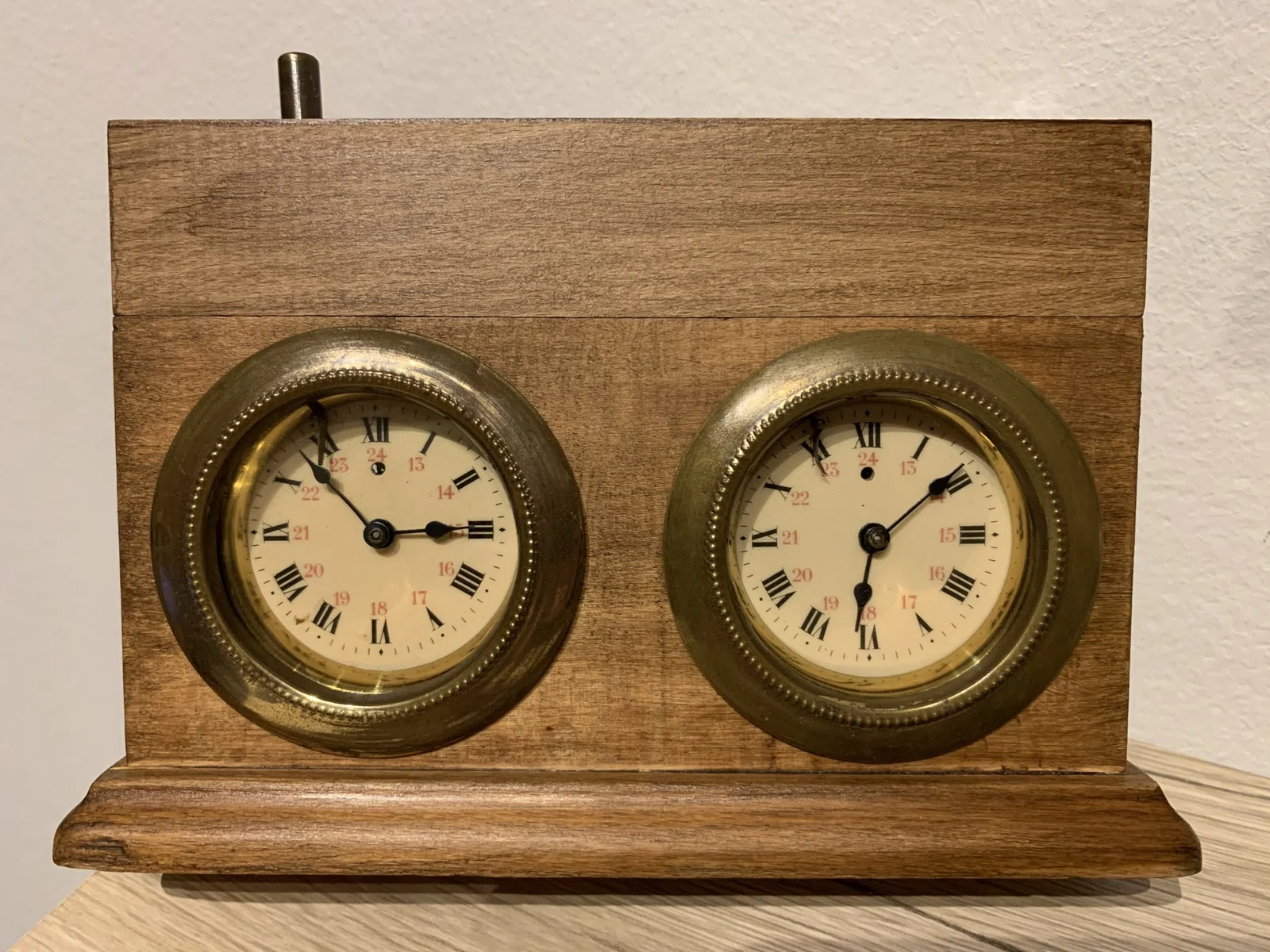 Rudolf Draxler chess clock with two brass dial surrounds.