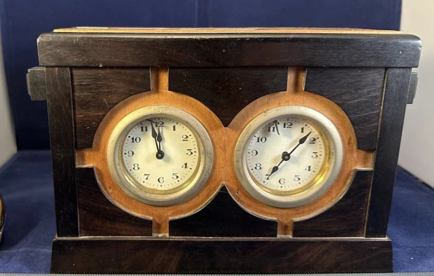Unidentified dark wooden chess clock with two round dials