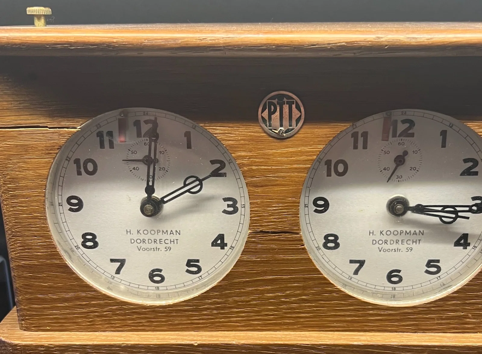 Institutional Markings Turn Ordinary Timers into Evidence of Workplace Leagues, Public Agencies, and Long-Lived Clubs.
